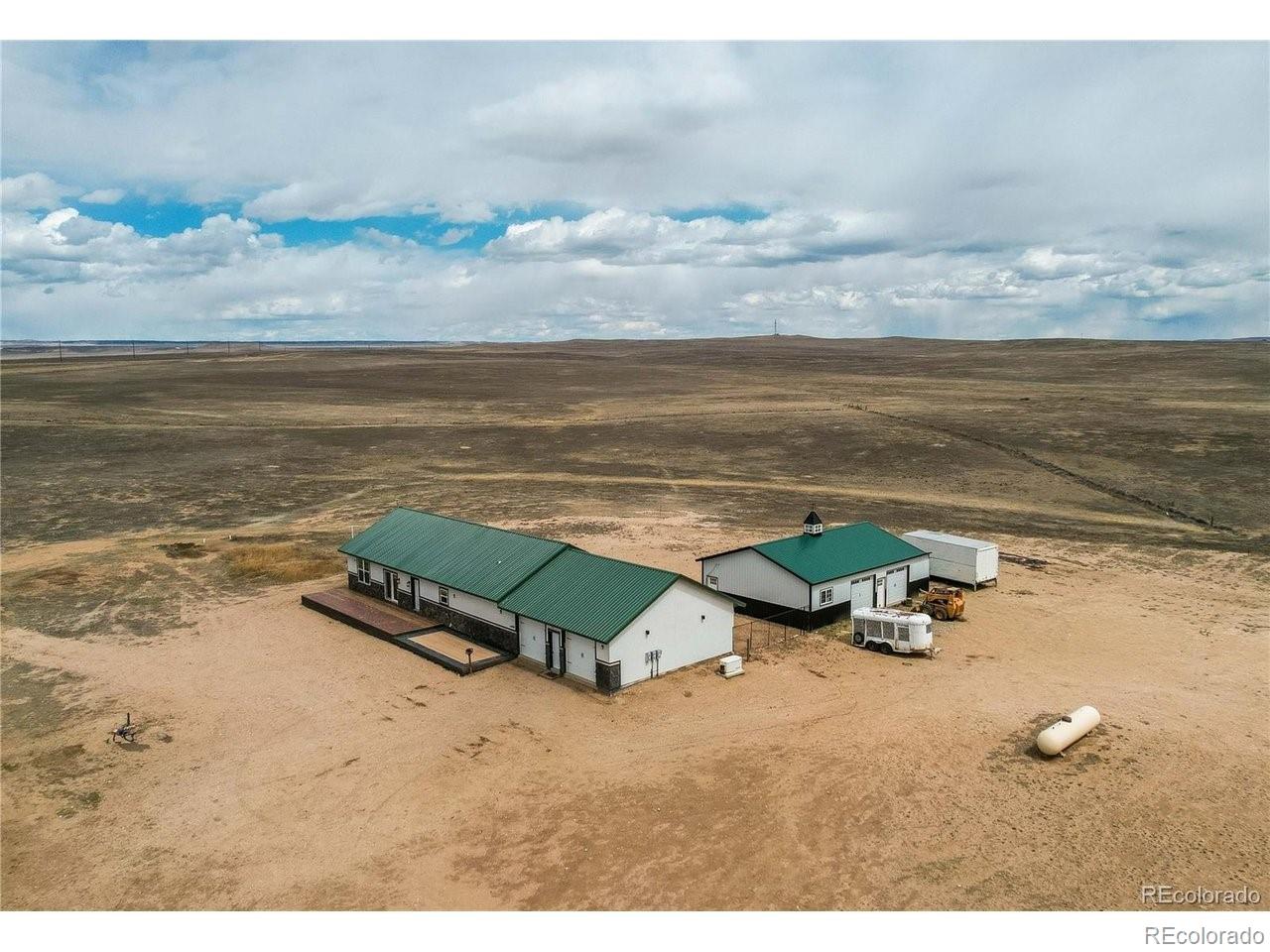 18298 Romar Rnch Road Carr, CO 80612 - Photo 1 of 49 a view of an ocean and beach