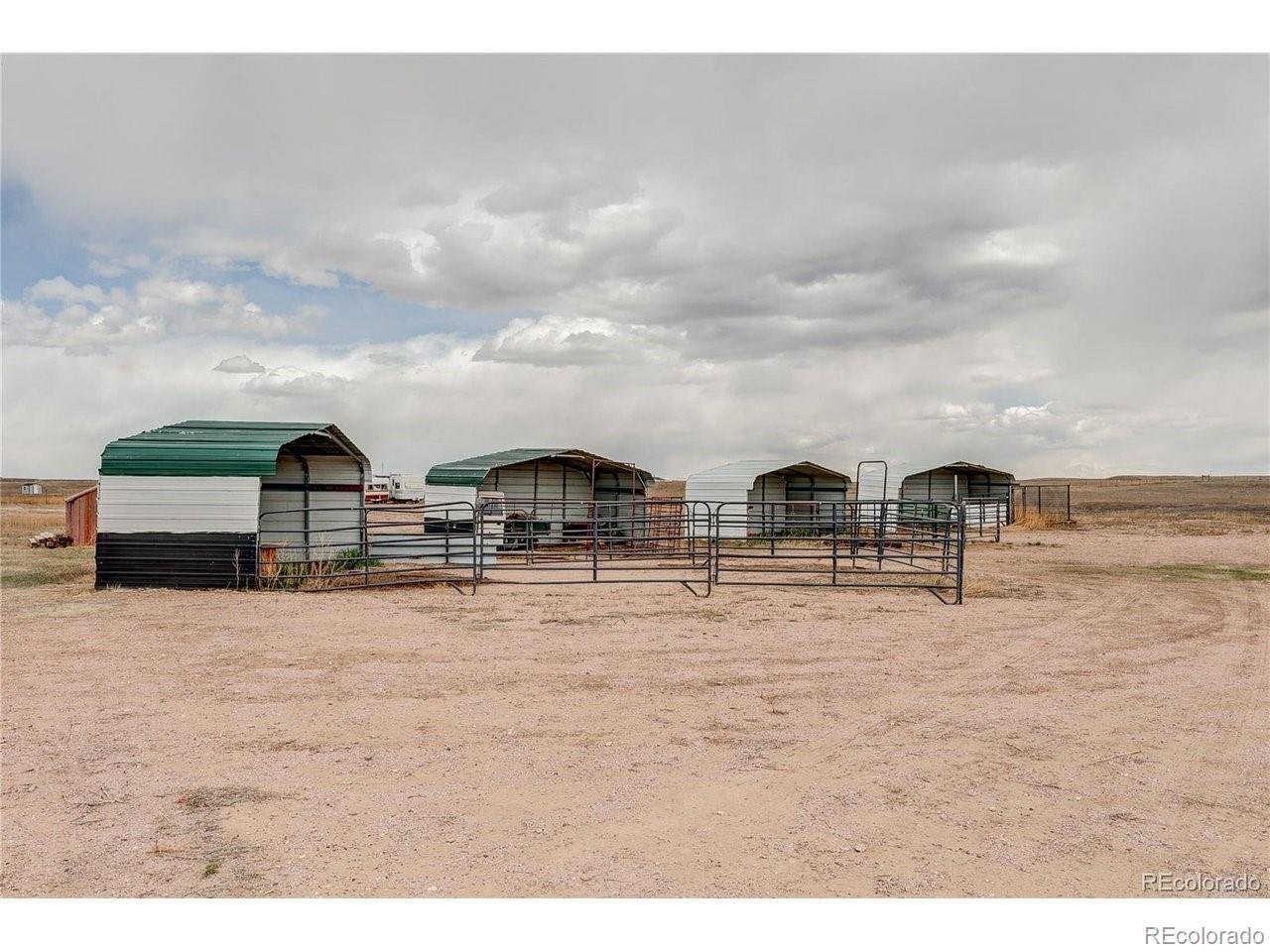 18298 Romar Rnch Road Carr, CO 80612 - Photo 35 of 49 a view of houses with outdoor space and