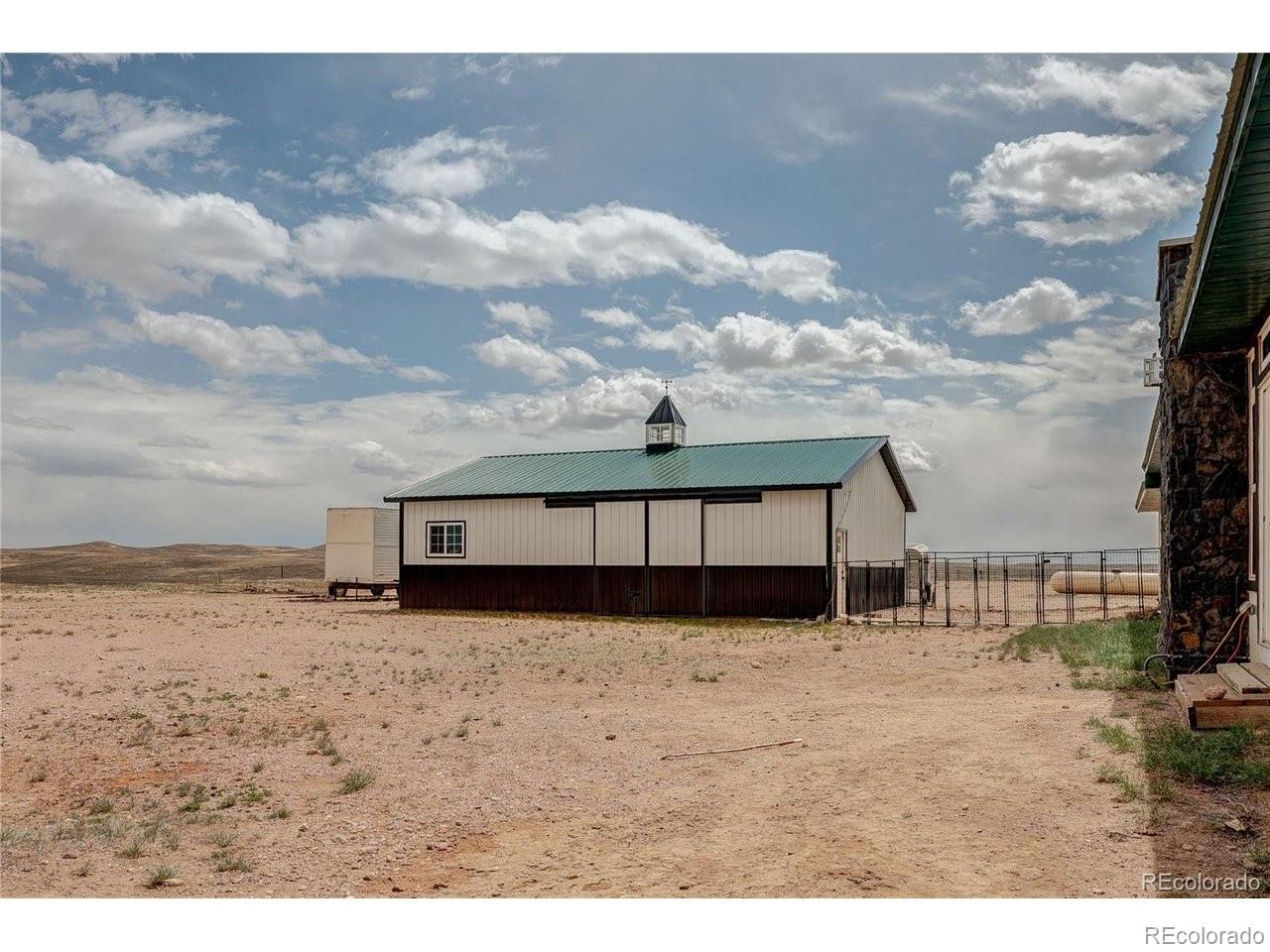 18298 Romar Rnch Road Carr, CO 80612 - Photo 37 of 49 a big yard with wooden fence