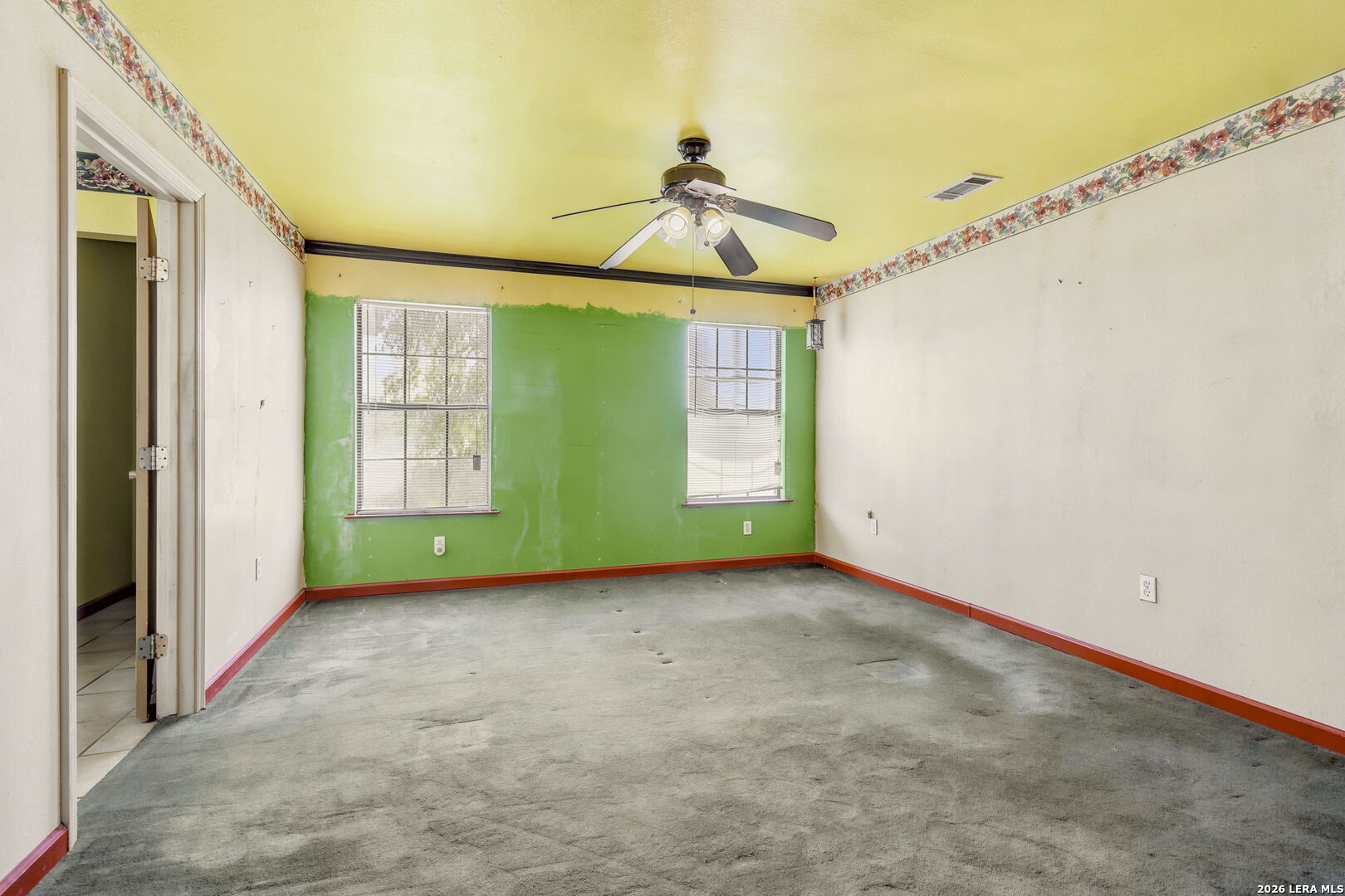 3061 Horse Ranch Road San Antonio, TX 78264 - Photo 17 of 34 a view of empty room with ceiling fan and window