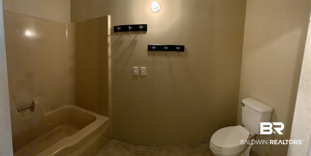 17071 County Road 52 Silverhill, AL 36576 - Photo 23 of 44 Tub/shower Combo and Toilet Area