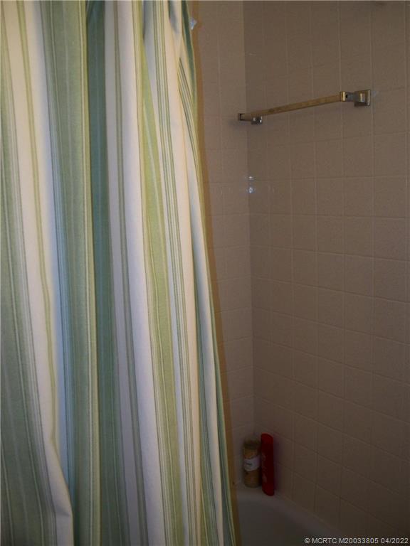 1913 Southwest Palm City Road, Unit 7B Stuart, FL 34994 - Photo 21 of 37 a close view of shower tap