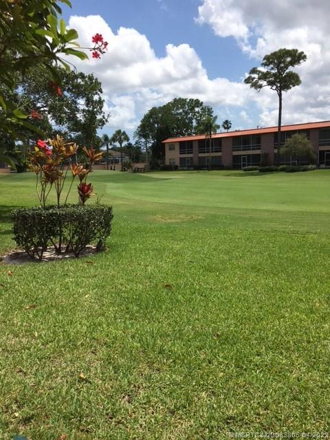 1913 Southwest Palm City Road, Unit 7B Stuart, FL 34994 - Photo 25 of 37 a view of a backyard