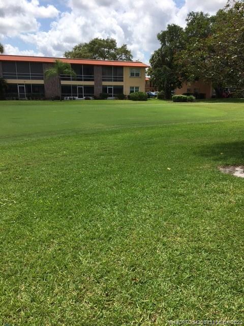 1913 Southwest Palm City Road, Unit 7B Stuart, FL 34994 - Photo 26 of 37 a view of a garden