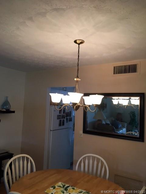 1913 Southwest Palm City Road, Unit 7B Stuart, FL 34994 - Photo 6 of 37 a view of a livingroom with furniture