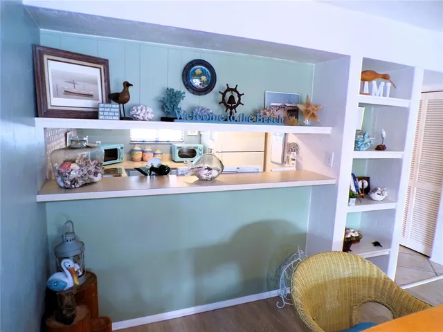 a room with toys and dresser