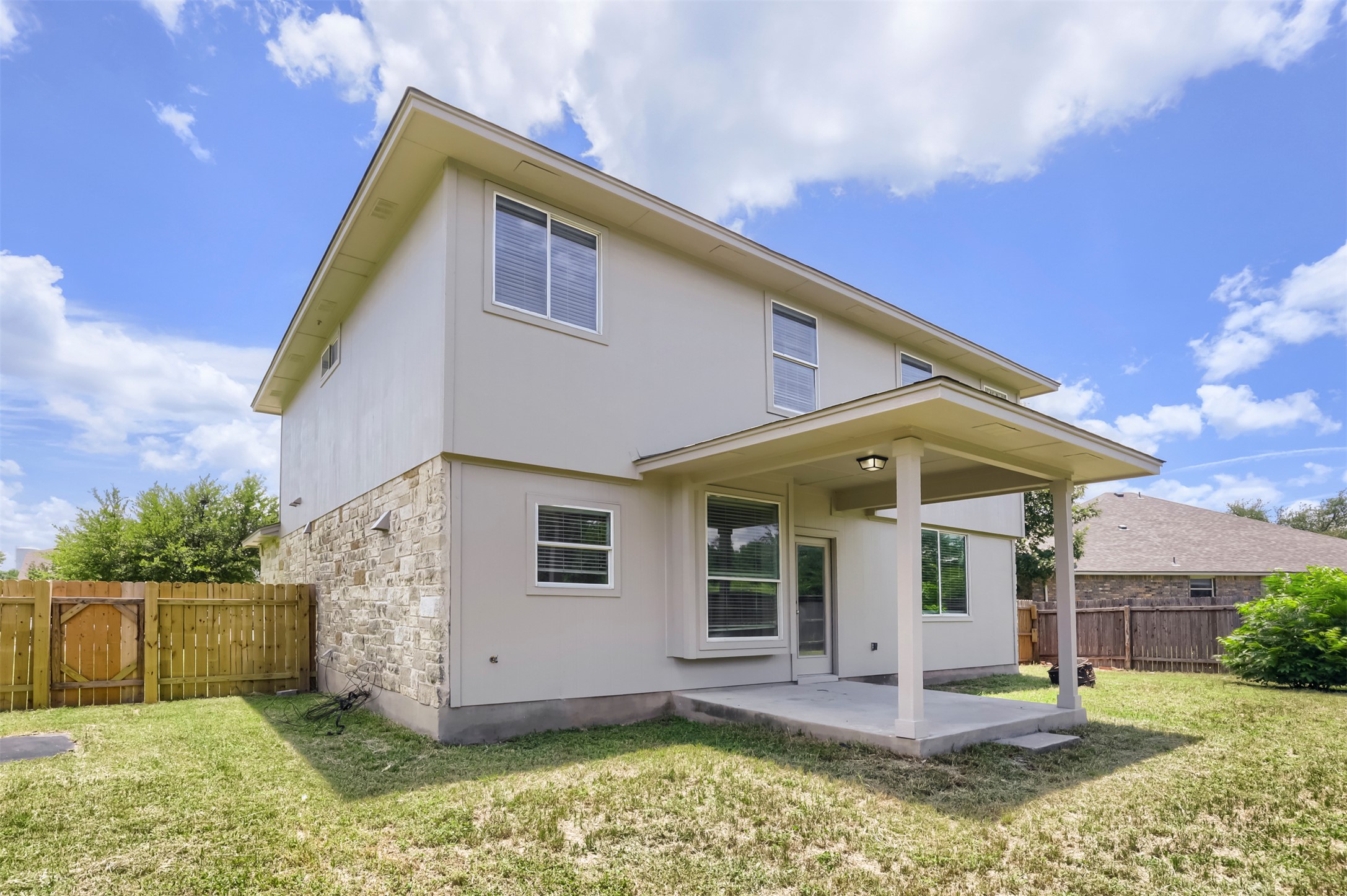 4125 Pebble Ridge Cove Round Rock, TX 78681 - Photo 28 of 30 A spacious backyard with a private covered patio offers an ideal setting for outdoor relaxation.