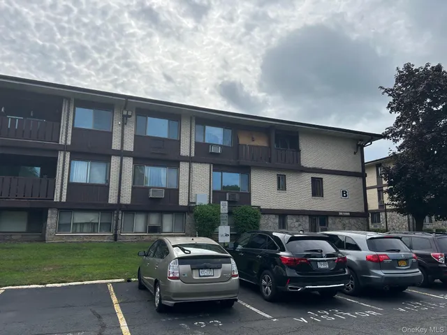 a car parked in front of a house