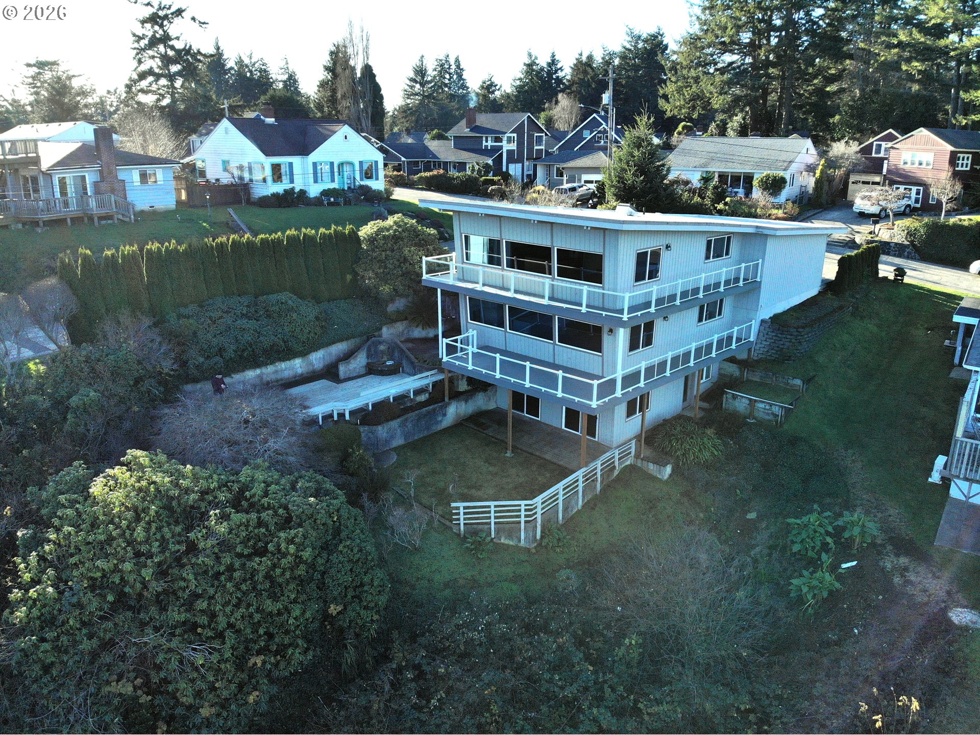 451 Simpson Avenue North Bend, OR 97459 - Photo 1 of 41 a view of residential houses with outdoor space and lake view
