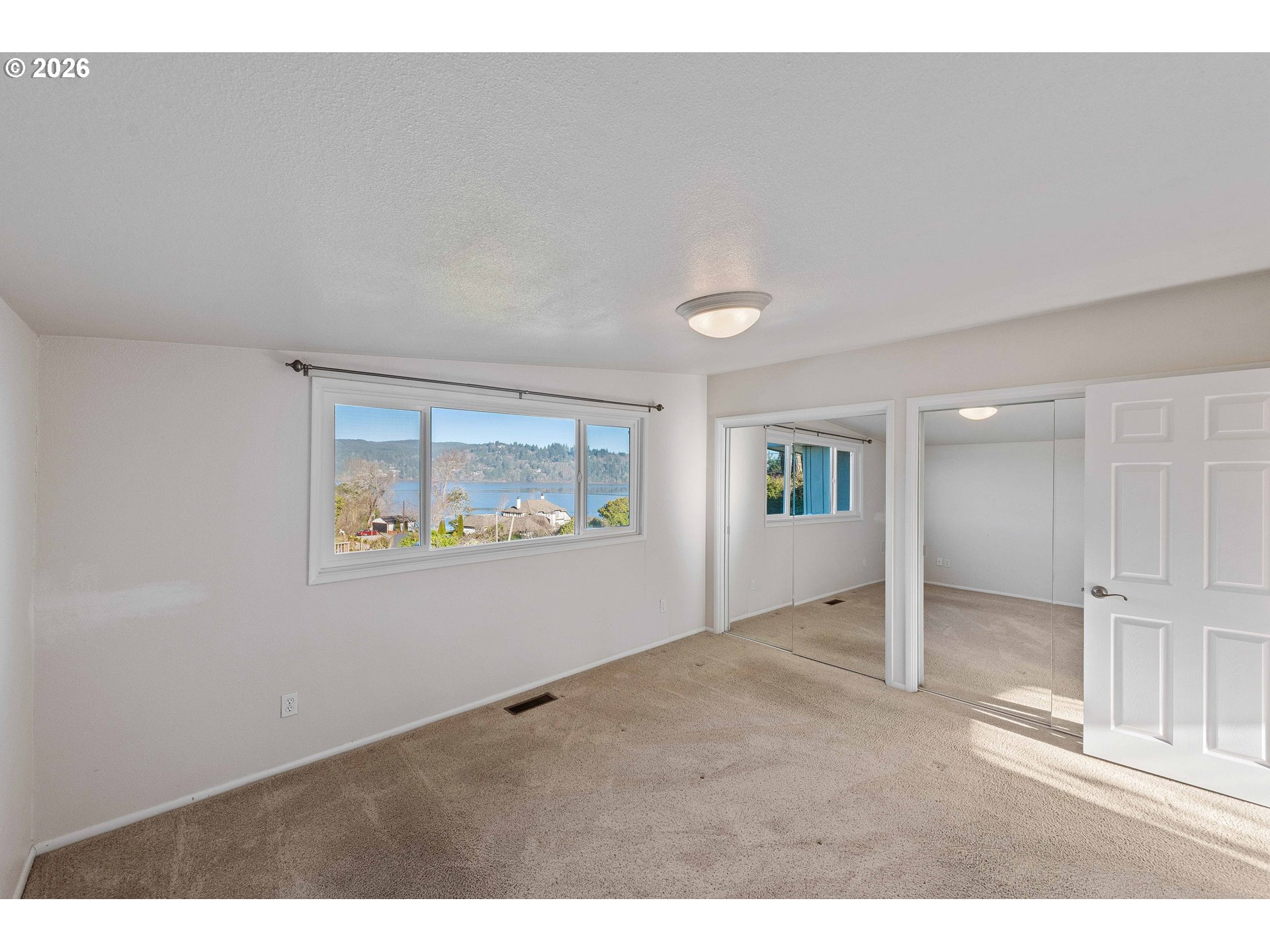 451 Simpson Avenue North Bend, OR 97459 - Photo 23 of 41 an empty room with closet