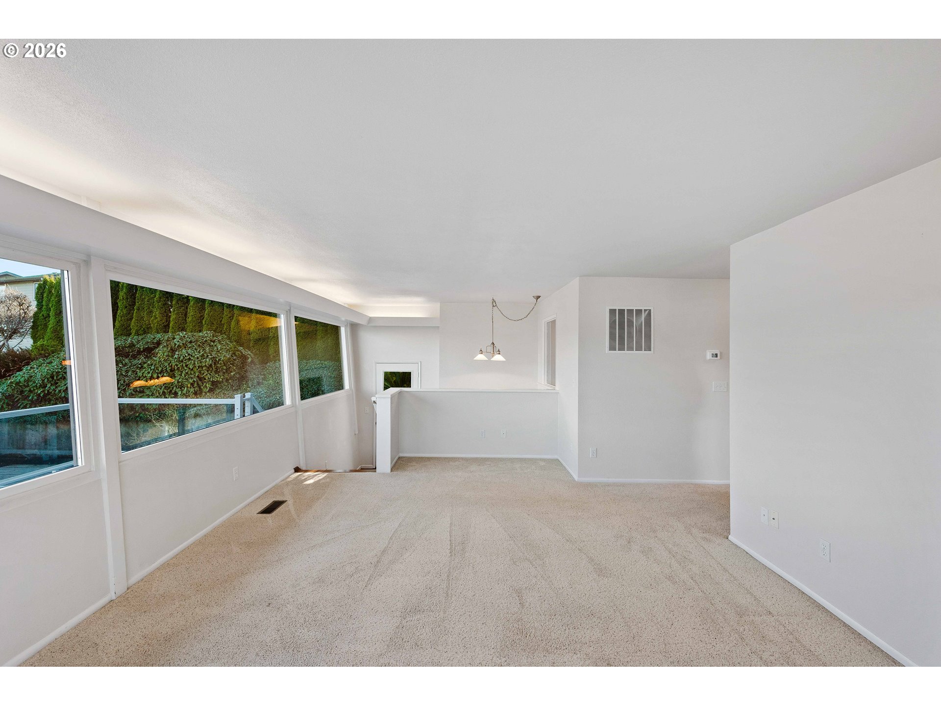 451 Simpson Avenue North Bend, OR 97459 - Photo 28 of 41 a view of empty room with wooden floor and fan