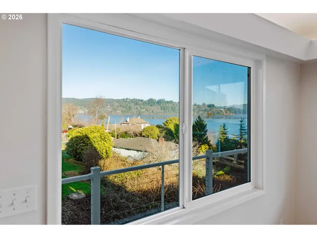 a view of a room with a large window