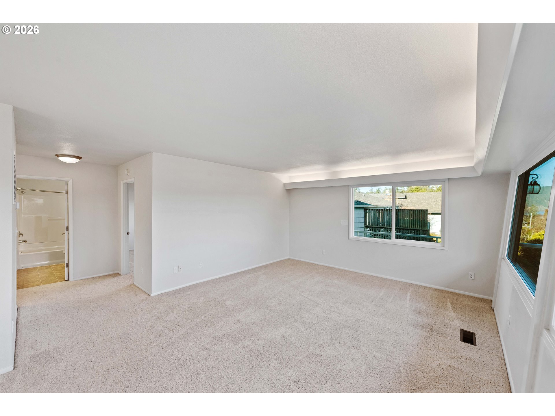 451 Simpson Avenue North Bend, OR 97459 - Photo 34 of 41 a view of an empty room with a window
