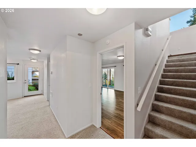 a view interior of a house with wooden floor and windows
