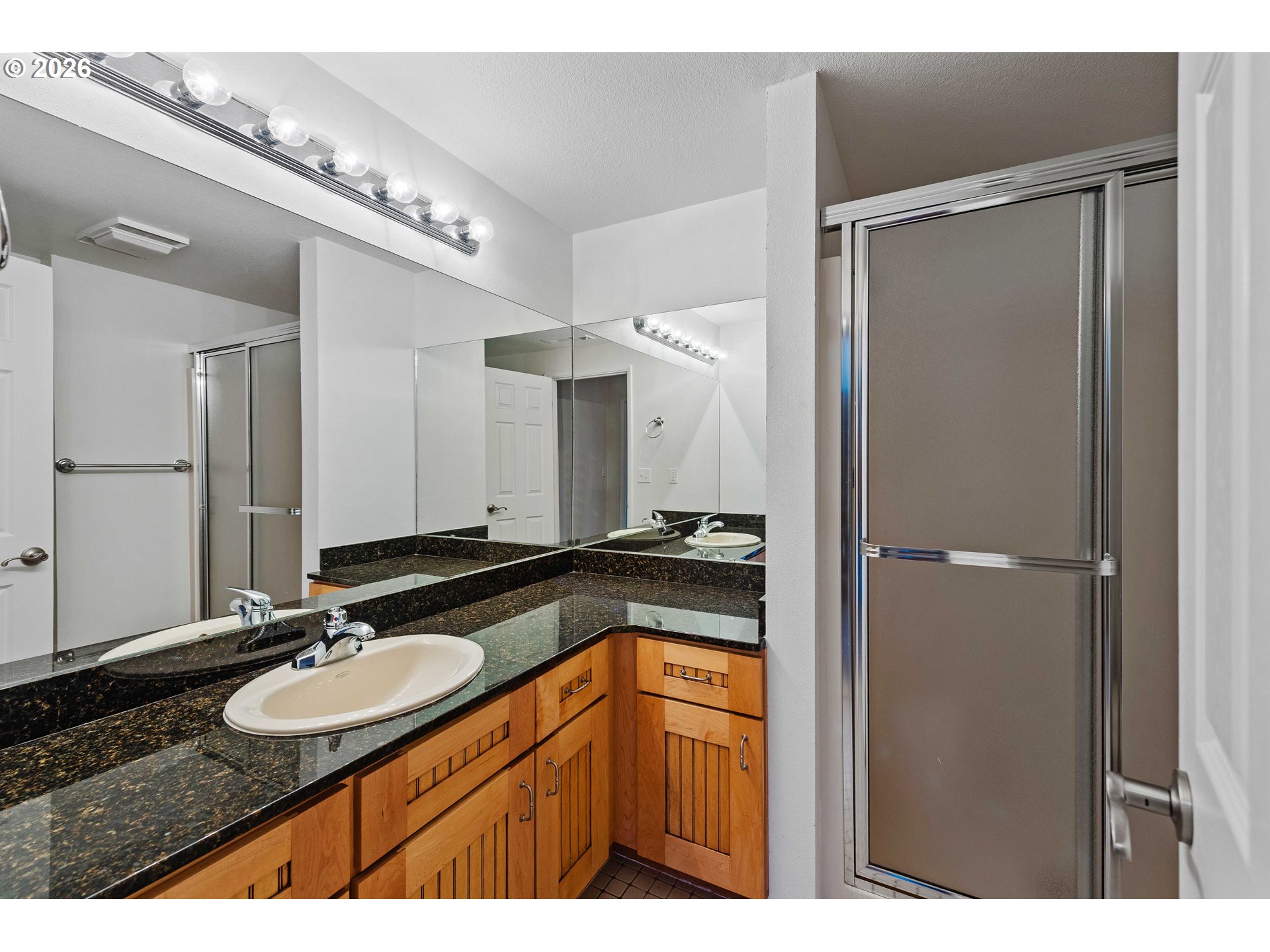 451 Simpson Avenue North Bend, OR 97459 - Photo 37 of 41 a bathroom with a sink and a mirror
