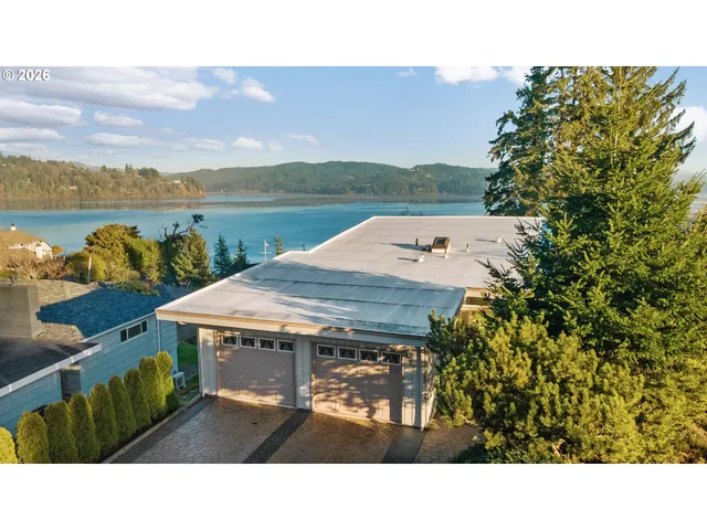 a view of a terrace with a table and chairs