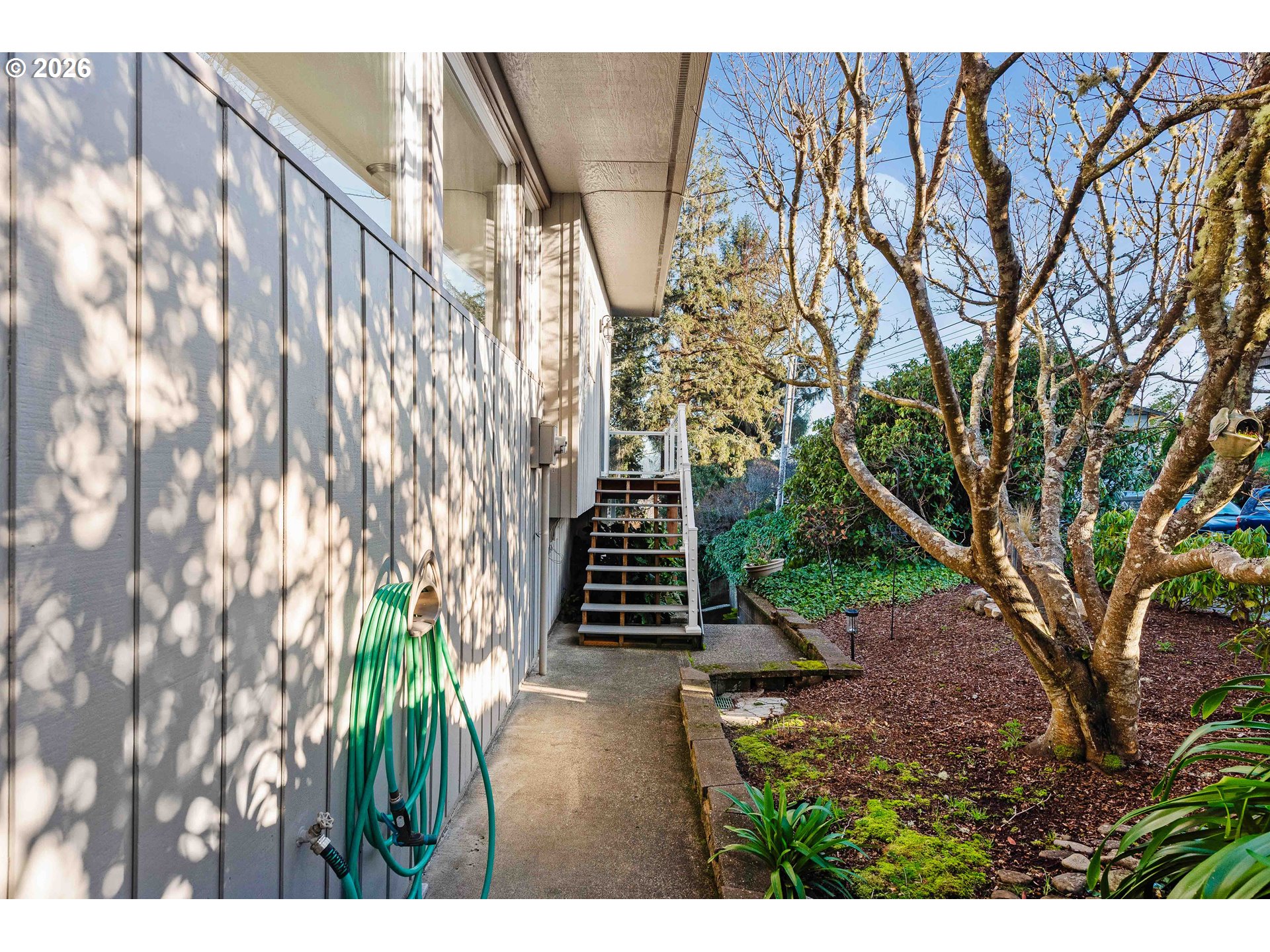 451 Simpson Avenue North Bend, OR 97459 - Photo 5 of 41 a view of entryway with garden