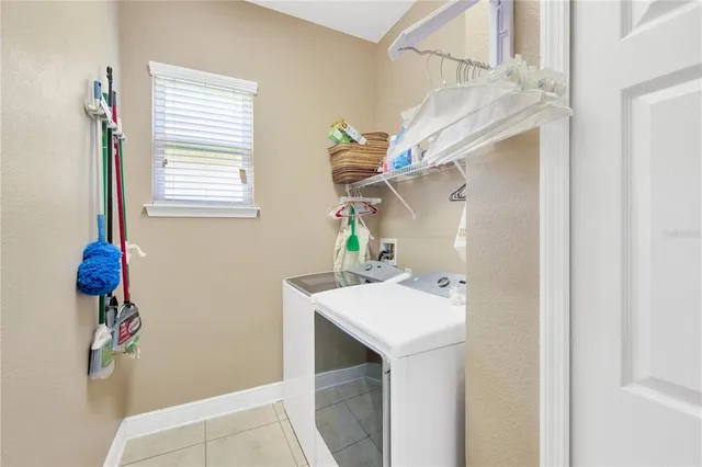 a bathroom with a sink a mirror and a window