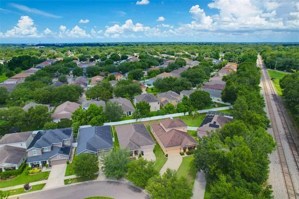 an aerial view of a house with a garden