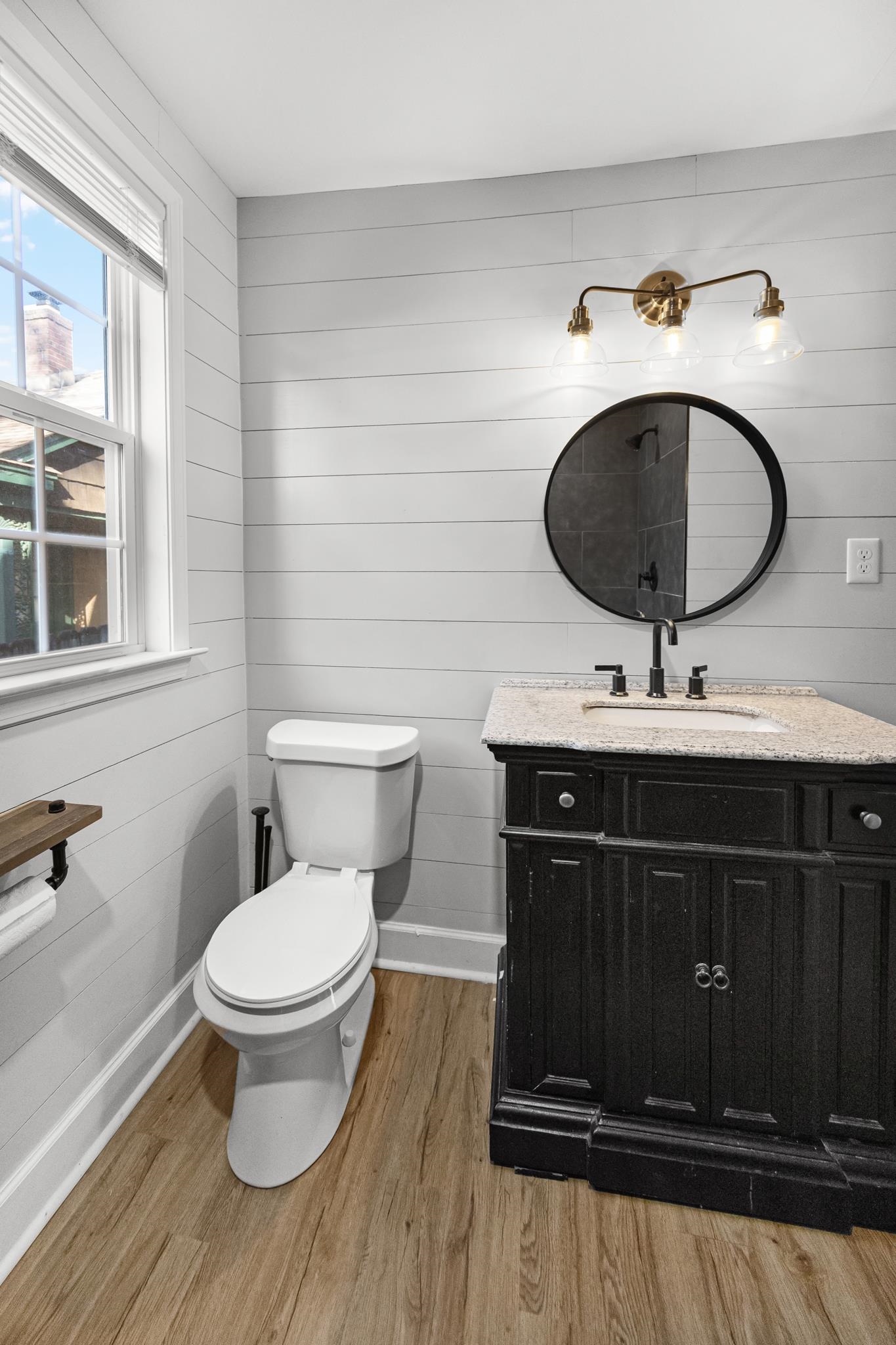 781 South Graham Street Memphis, TN 38111 - Photo 21 of 39 a bathroom with a sink and a mirror