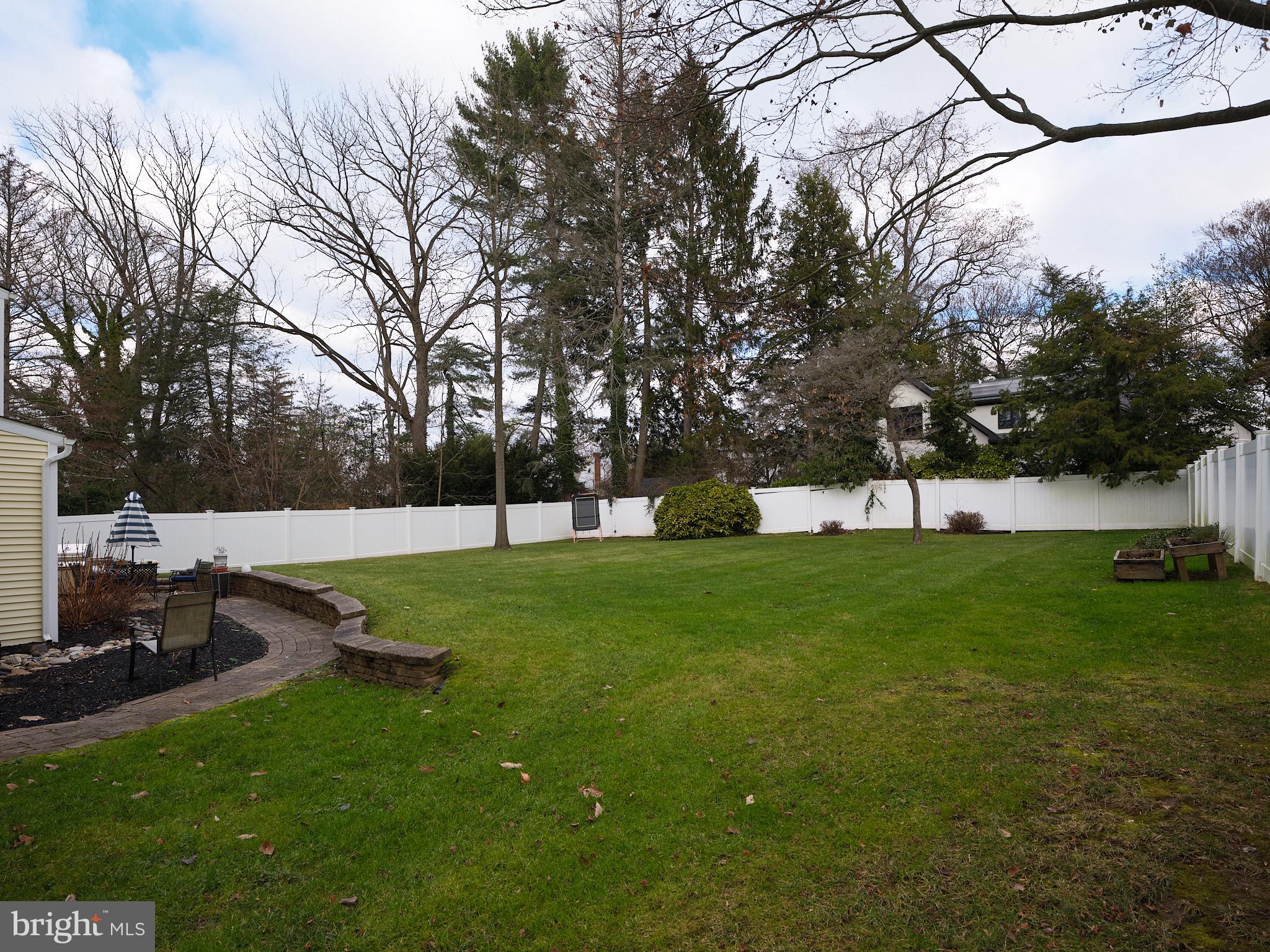 8 Green Ridge Road Yardley, PA 19067 - Photo 33 of 39 The backyard is wrapped in a privacy fence
