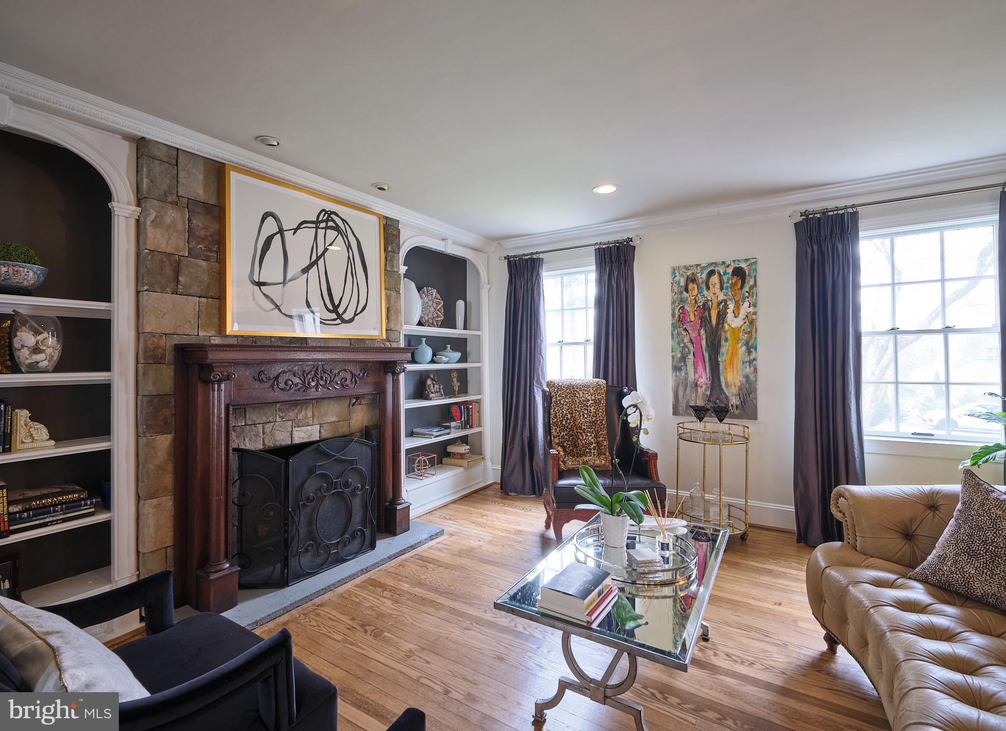 8 Green Ridge Road Yardley, PA 19067 - Photo 7 of 39 Custom built ins flank the wood burning fireplace