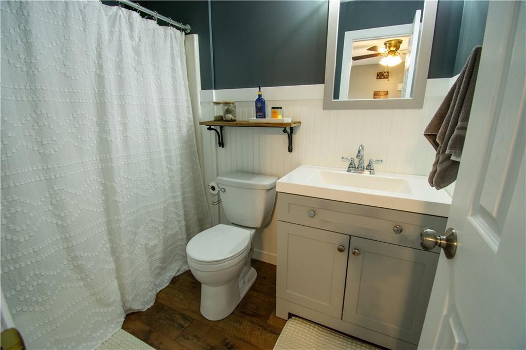 222 Carters Grove Drive Gibsonia, PA 15044 - Photo 22 of 27 a bathroom with a sink toilet and mirror