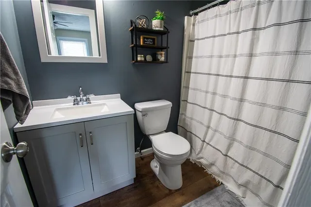 a front view of house with yard and outdoor seating