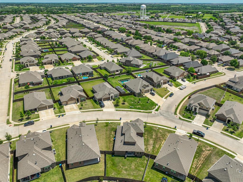 3106 Maverick Drive Forney, TX 75126 - Photo 29 of 32 an aerial view of residential houses with outdoor space