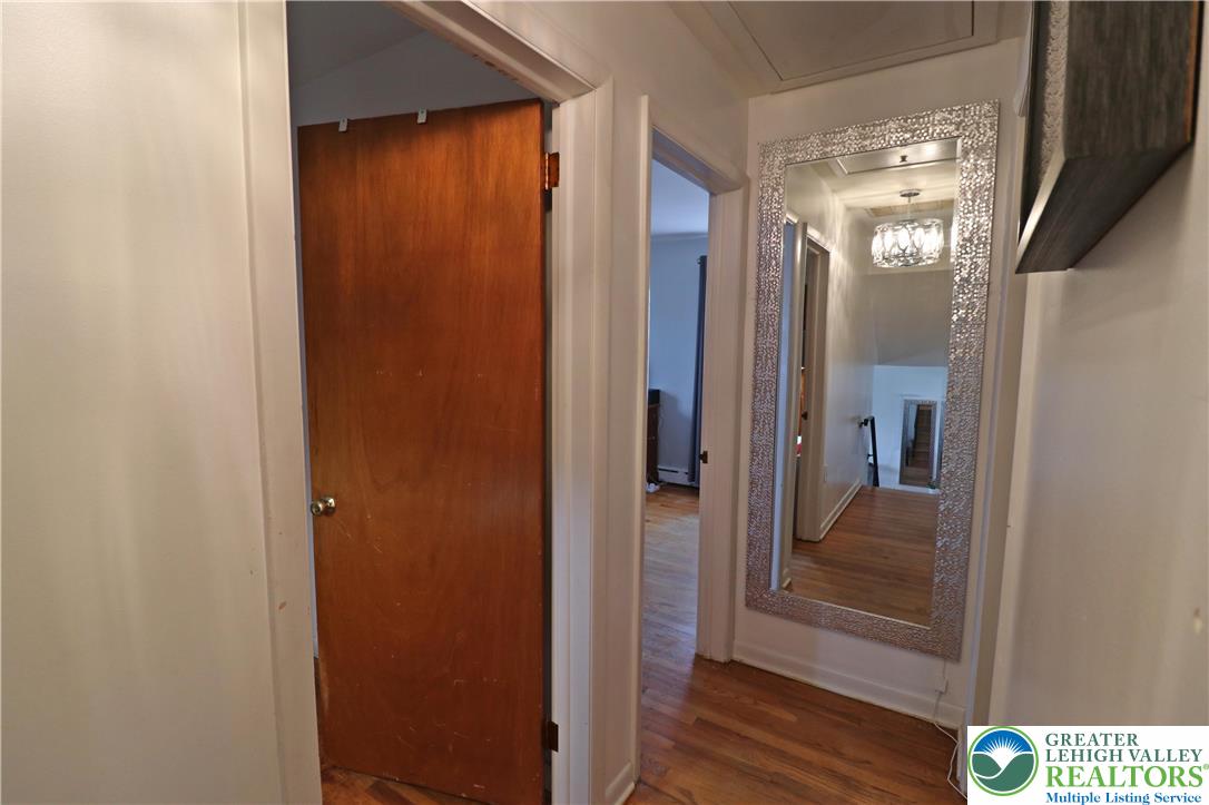 1022 Hilton Street Bethlehem, PA 18017 - Photo 15 of 35 a view of a hallway with wooden floor and closet