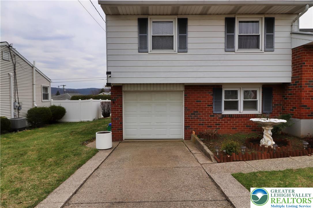 1022 Hilton Street Bethlehem, PA 18017 - Photo 2 of 35 a front view of a house with a yard