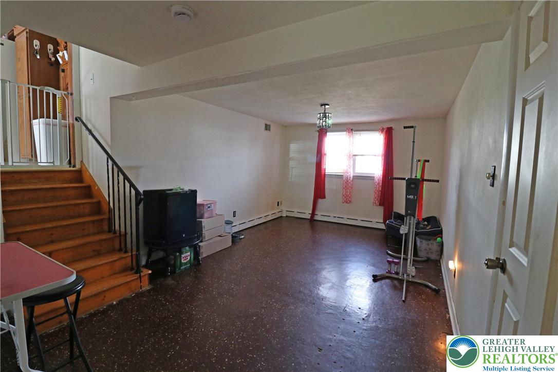 1022 Hilton Street Bethlehem, PA 18017 - Photo 23 of 35 a view of empty room with wooden floor and windows
