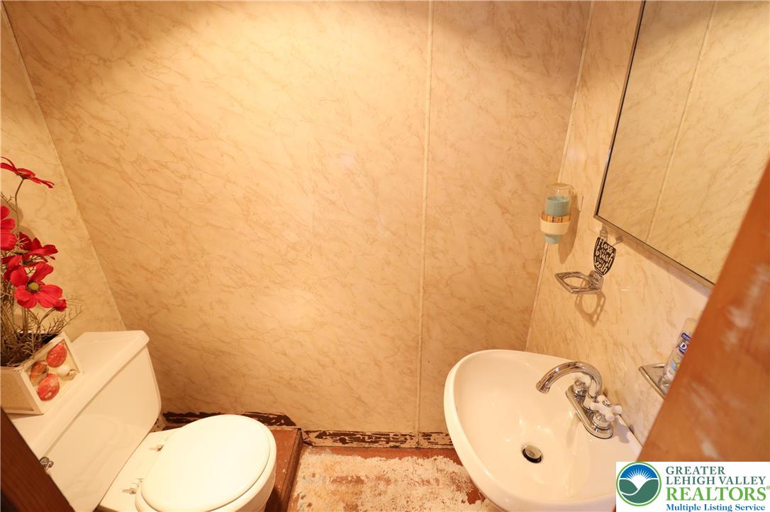 1022 Hilton Street Bethlehem, PA 18017 - Photo 28 of 35 a bathroom with a toilet and a sink