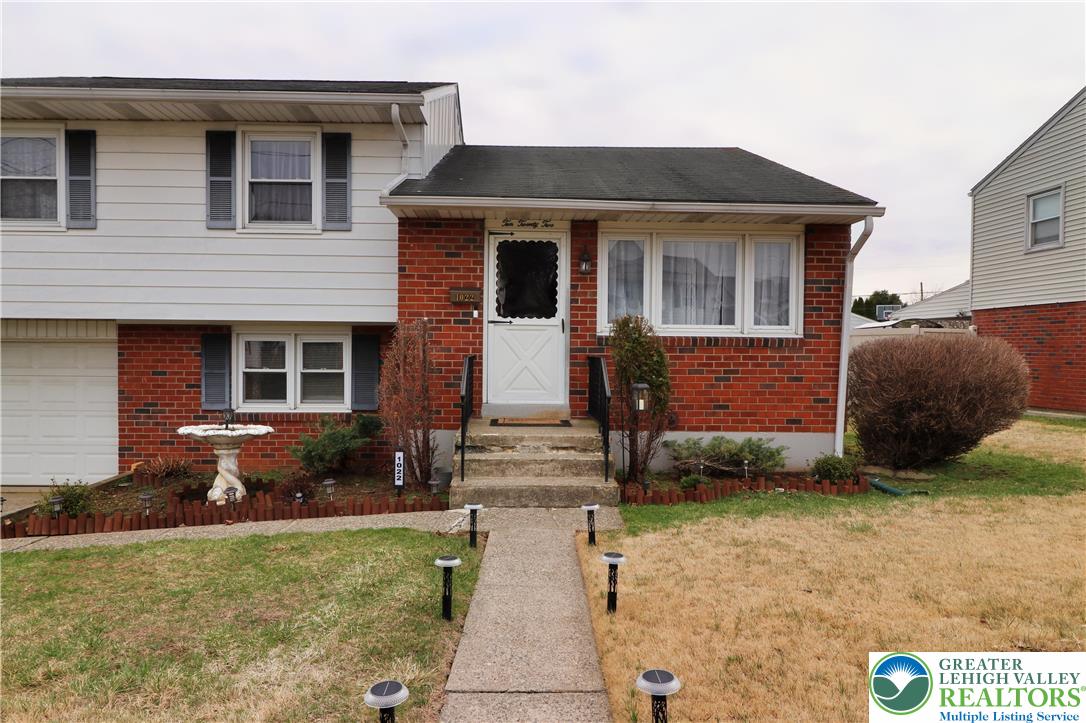 1022 Hilton Street Bethlehem, PA 18017 - Photo 3 of 35 a front view of a house with garden