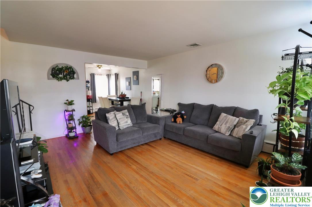 1022 Hilton Street Bethlehem, PA 18017 - Photo 4 of 35 a living room with furniture and a wooden floor