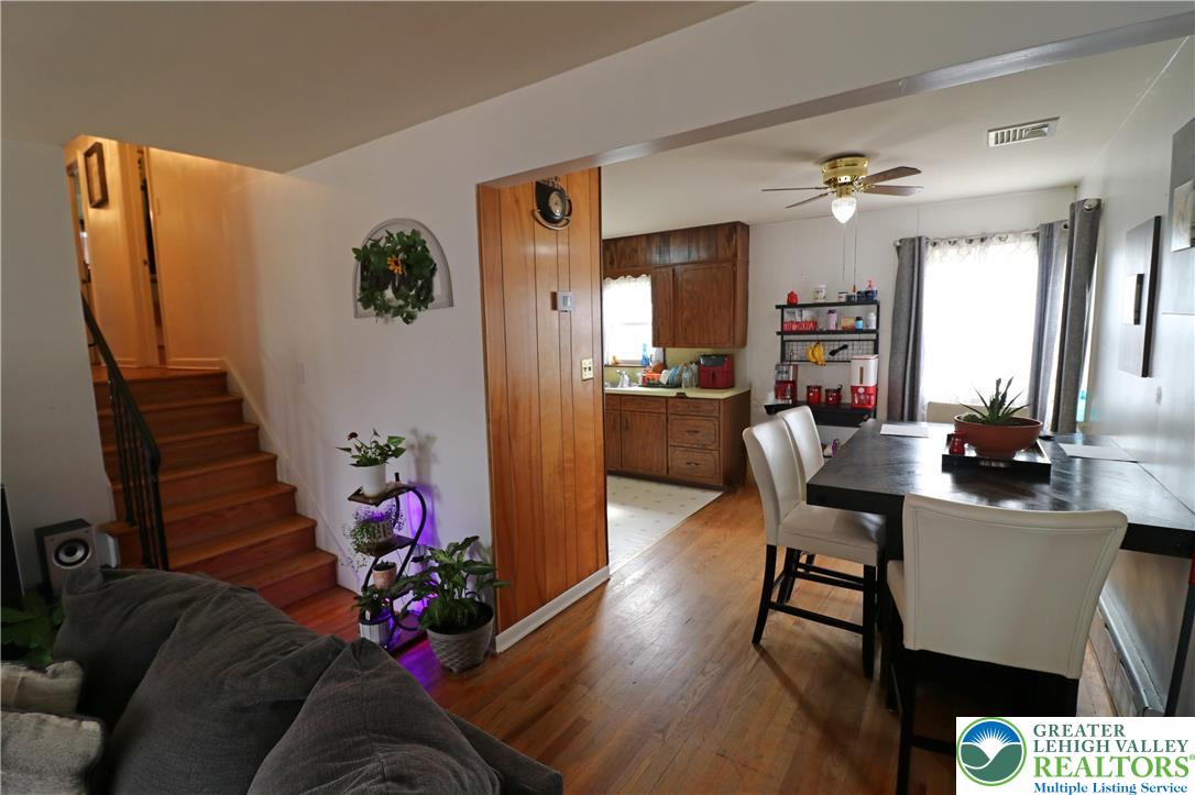 1022 Hilton Street Bethlehem, PA 18017 - Photo 6 of 35 a living room with furniture wooden floor and a flat screen tv