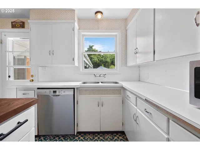 a bedroom with a bed and a table