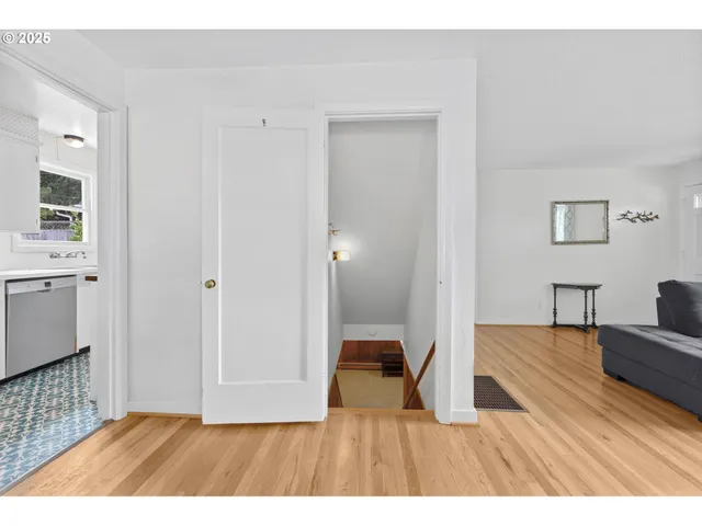a view of a bathroom from a hallway