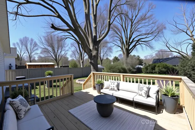 a view of wooden deck with furniture