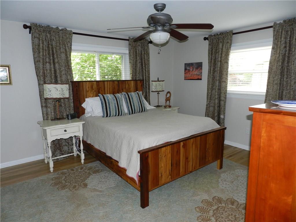 216 Lytton Road Coraopolis, PA 15108 - Photo 14 of 25 Your master bedroom features double closets, ceiling fan, gleaming hardwoods and two large windows to provide tons of natural light.