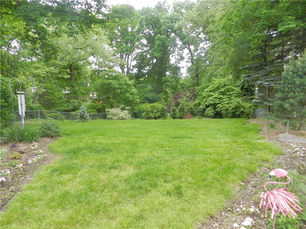 216 Lytton Road Coraopolis, PA 15108 - Photo 3 of 25 Totally fenced in large level backyard! Vegetable garden and loads of trees line the perimeter for privacy.