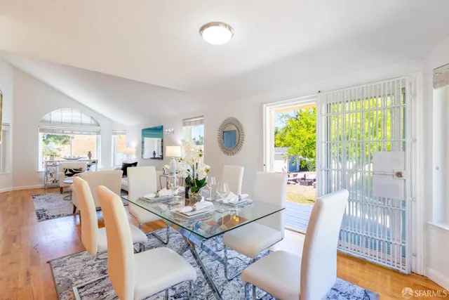 a living room with furniture or couch and a large window