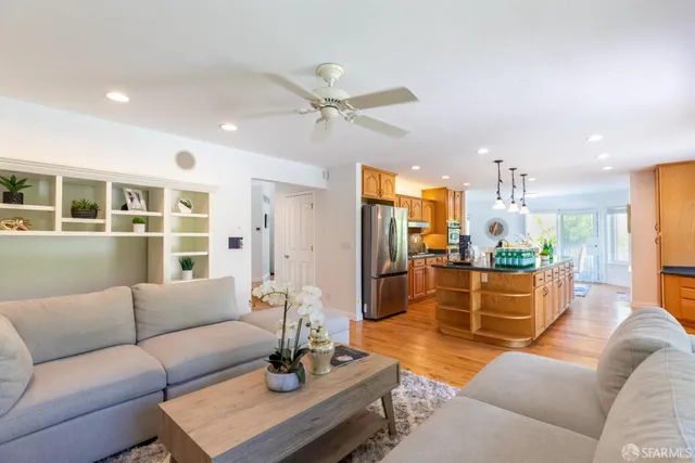 a bathroom with a double vanity sink a mirror and a bathtub