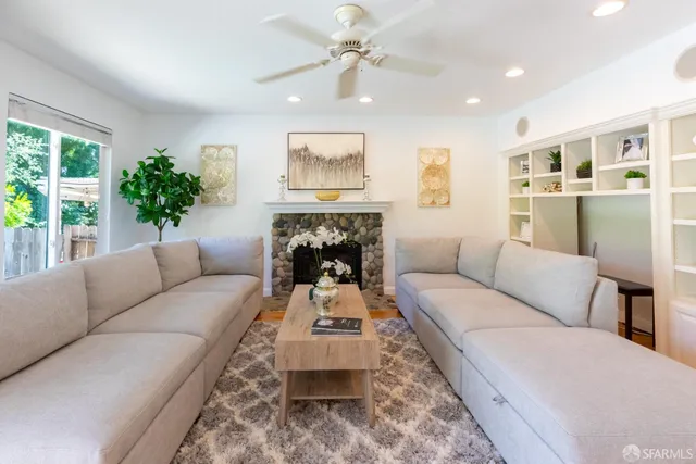 a white toilet sitting next to a bathroom sink