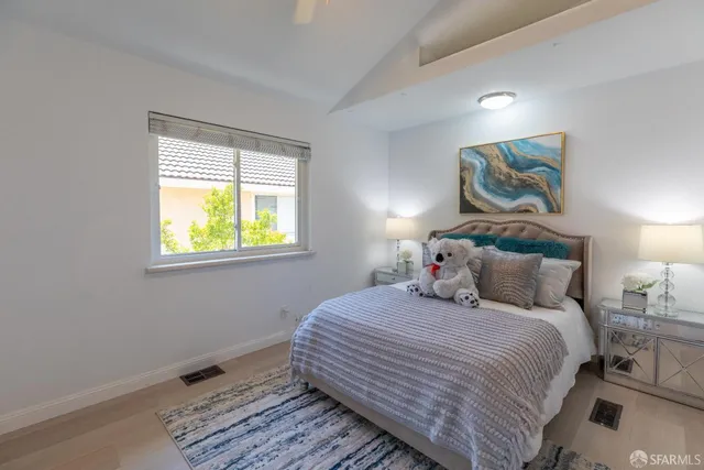 a workspace with furniture and painting on the wall