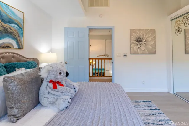 a view of a house with backyard sitting area and garden