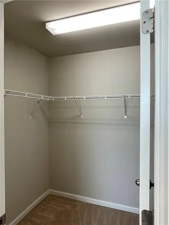 a view of a room with racks on the wall