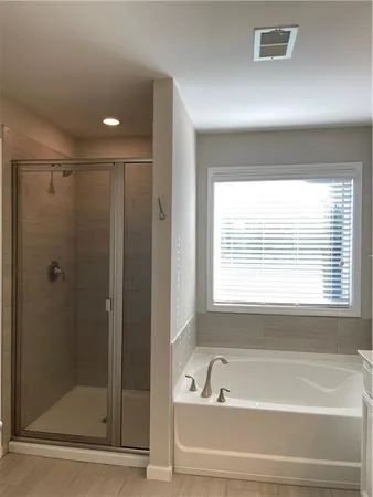 an empty room with closet area
