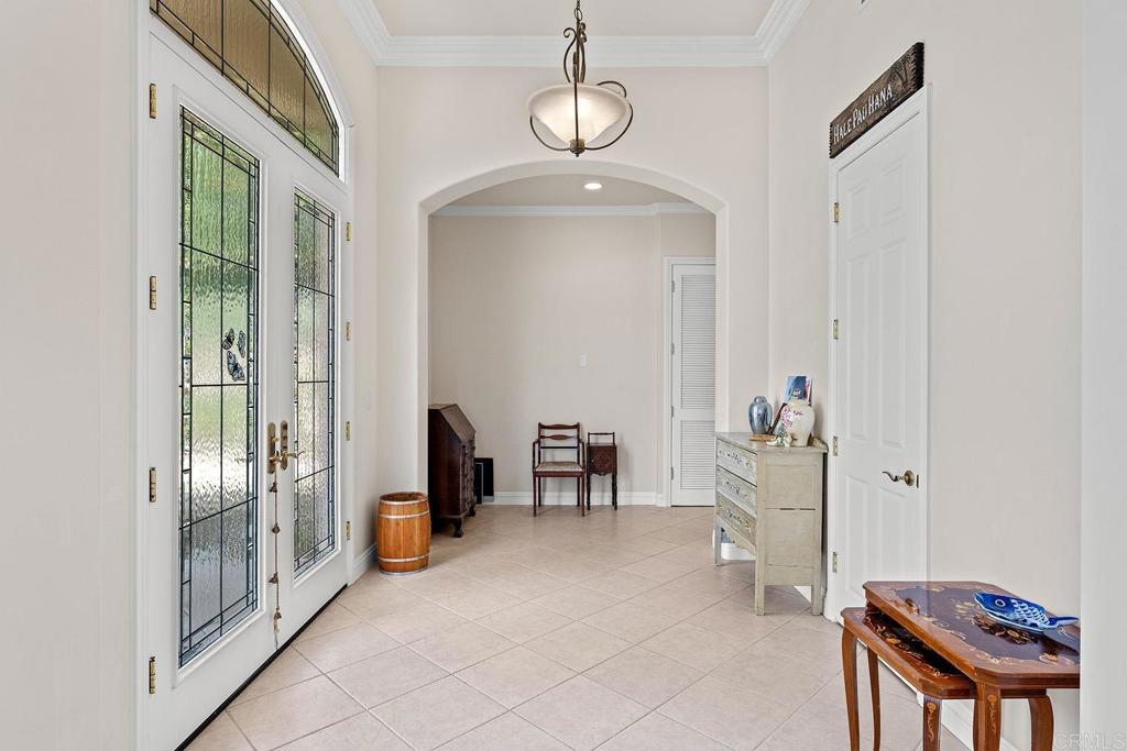 2557 Live Oak Park Road Fallbrook, CA 92028 - Photo 21 of 53 a view of a hallway with livingroom and dining room view