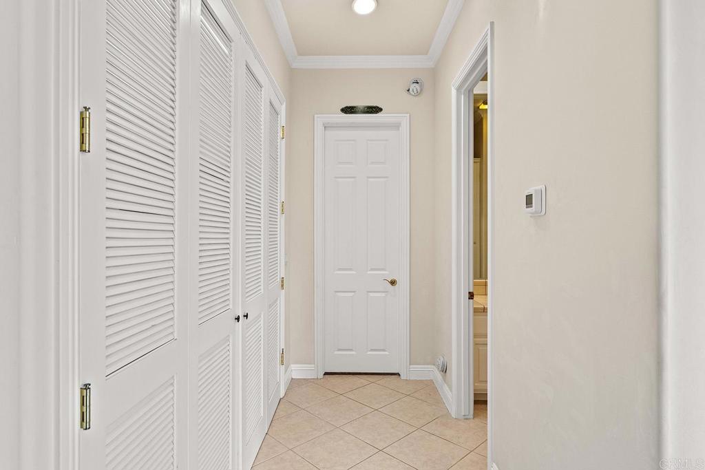 2557 Live Oak Park Road Fallbrook, CA 92028 - Photo 22 of 53 a view of a hallway with closet area